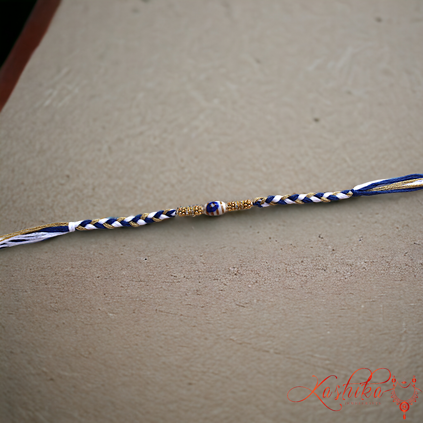 Blue Twisted Knot Thread Rakhi