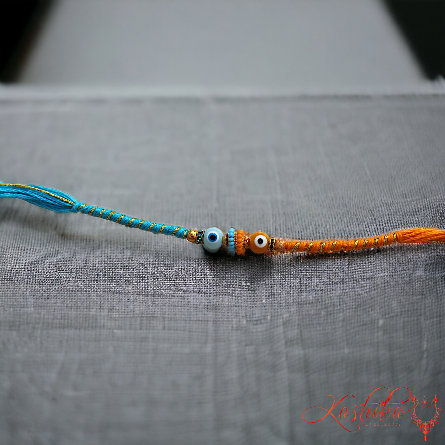 Blue and Orange Evil Eye Rakhi