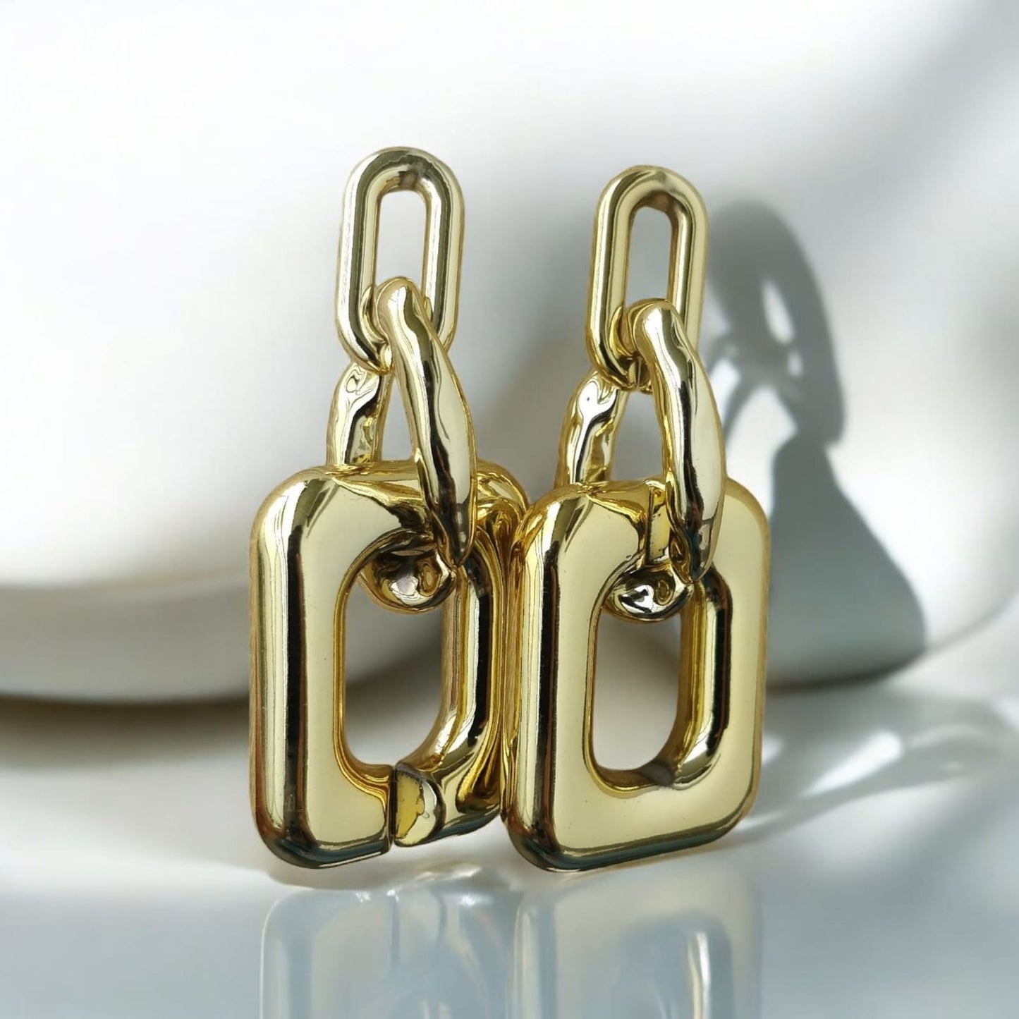 Classic geometrical drop earrings