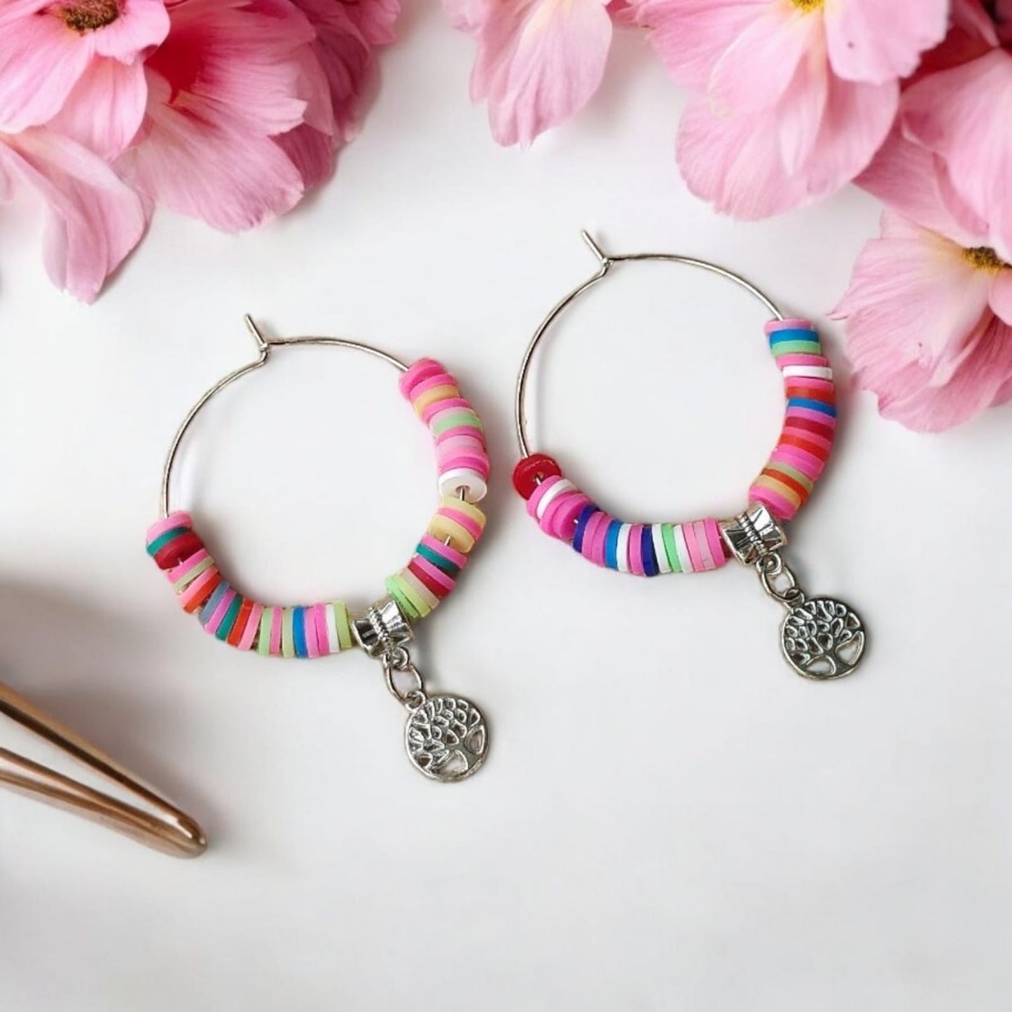 Hoop earrings with colorful beads and charm of peace