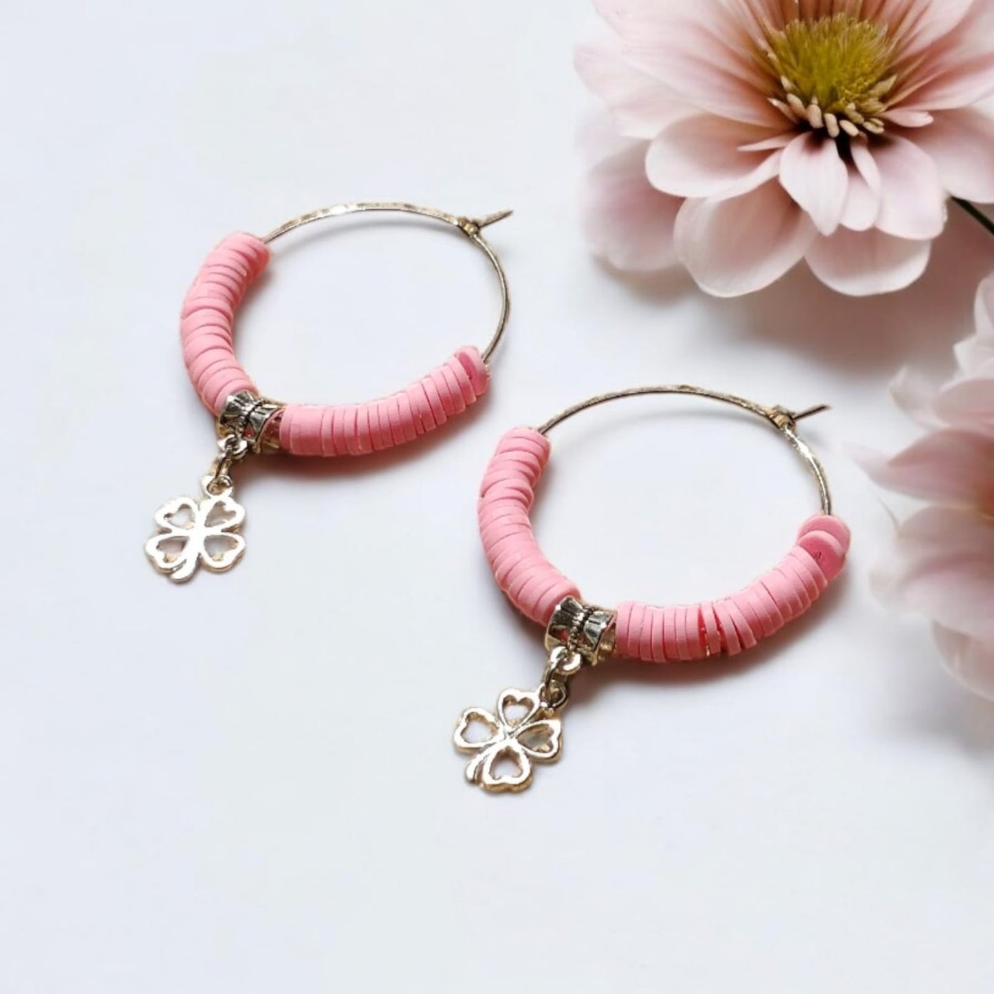 Hoop earrings with pink beads and charm