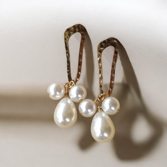 Gold tone drop pearl earrings