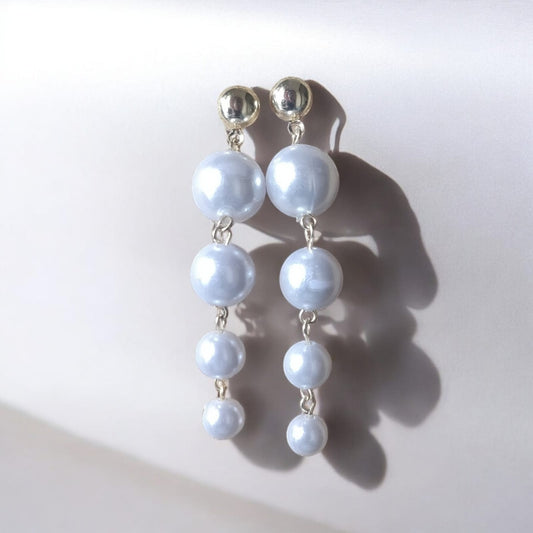 Golden pearl drop earrings