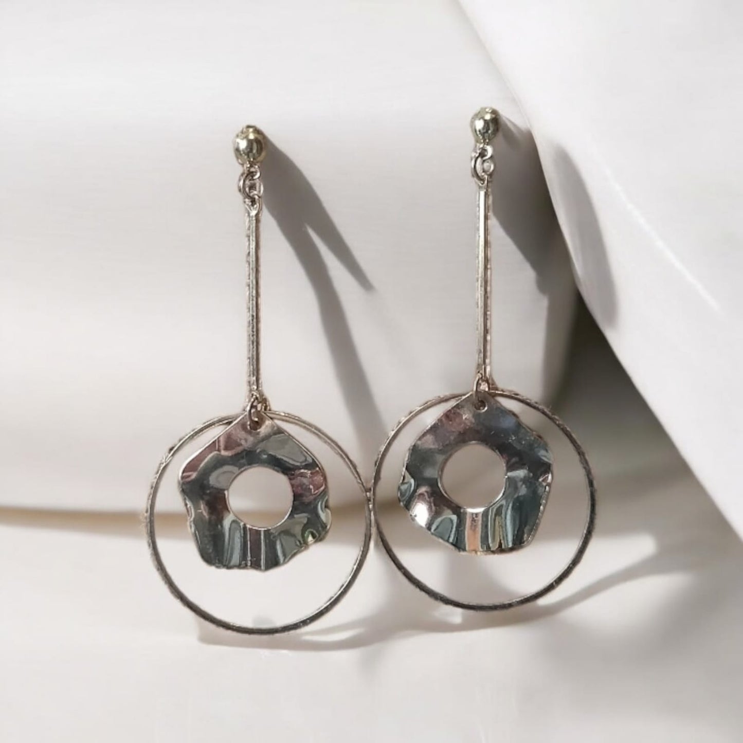 Gold plated circular long dangler earring