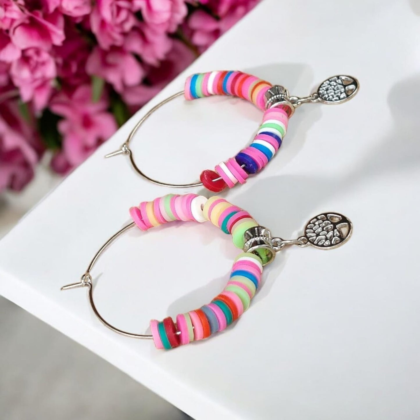 Hoop earrings with colorful beads and charm of peace