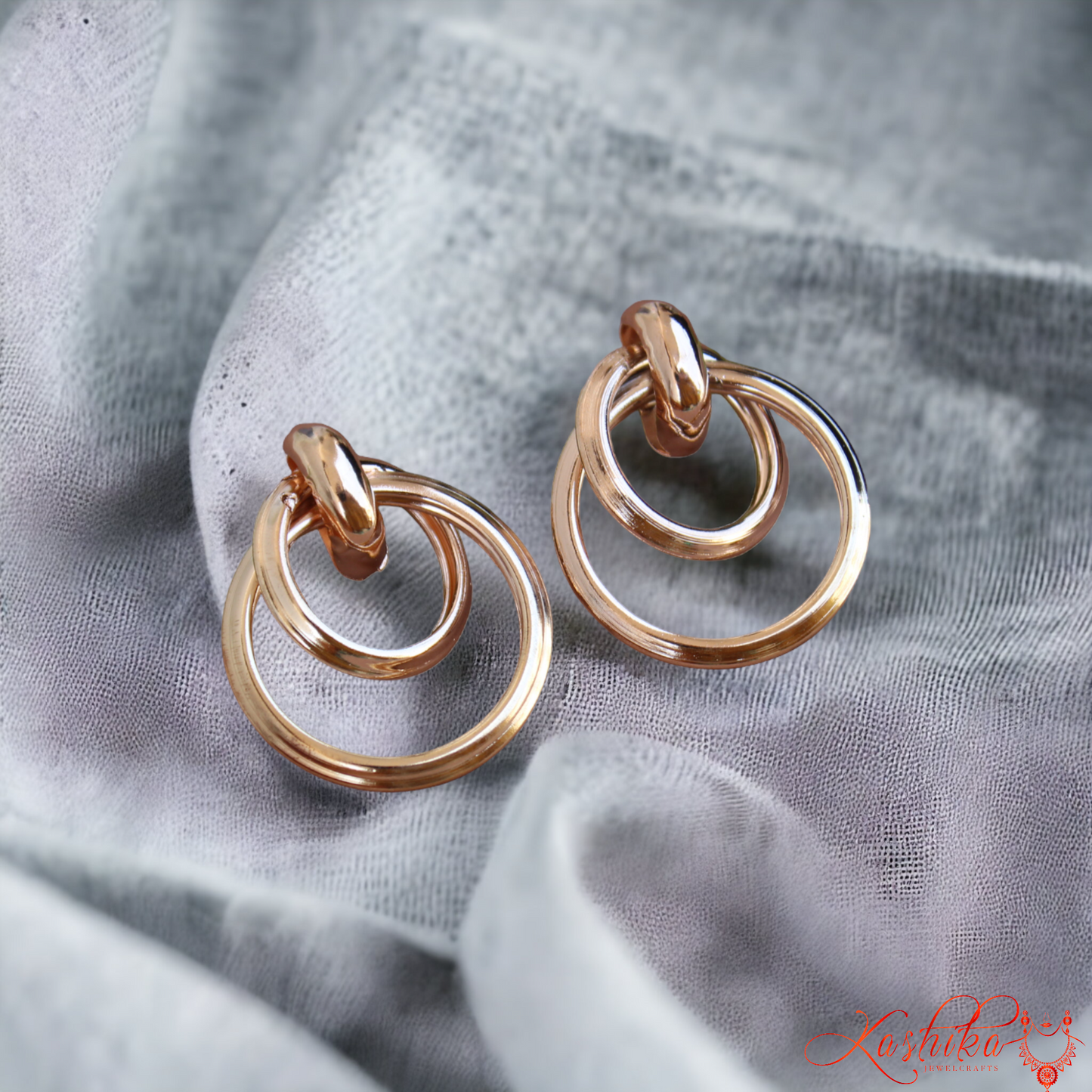 Golden Twisted Oversized Stud Earrings